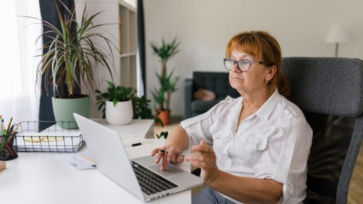 A woman using a laptop computer